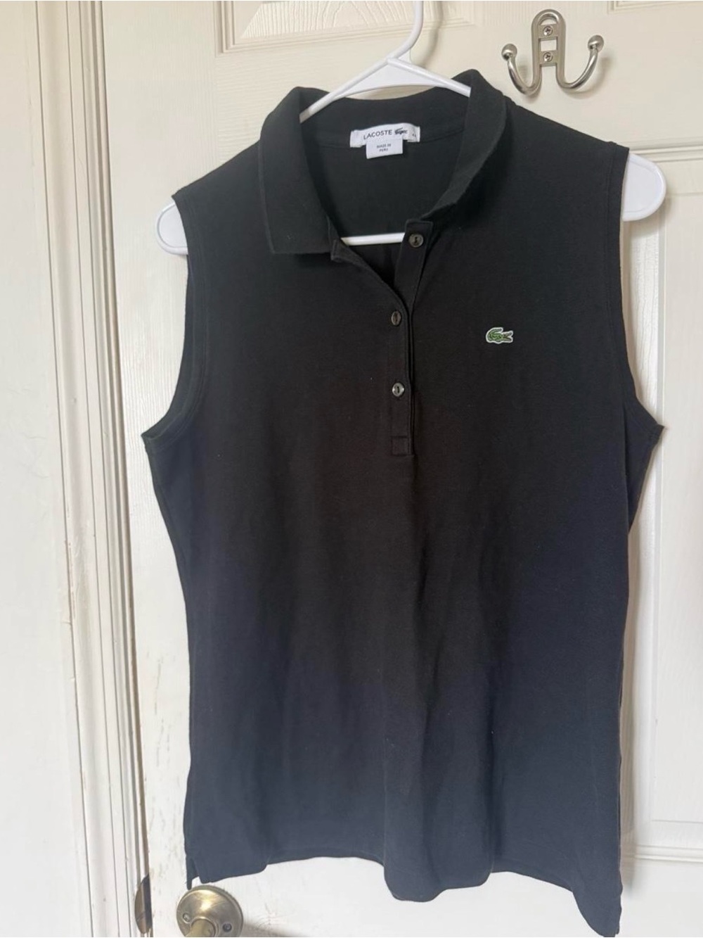 Lacoste black women’s sleeveless polo